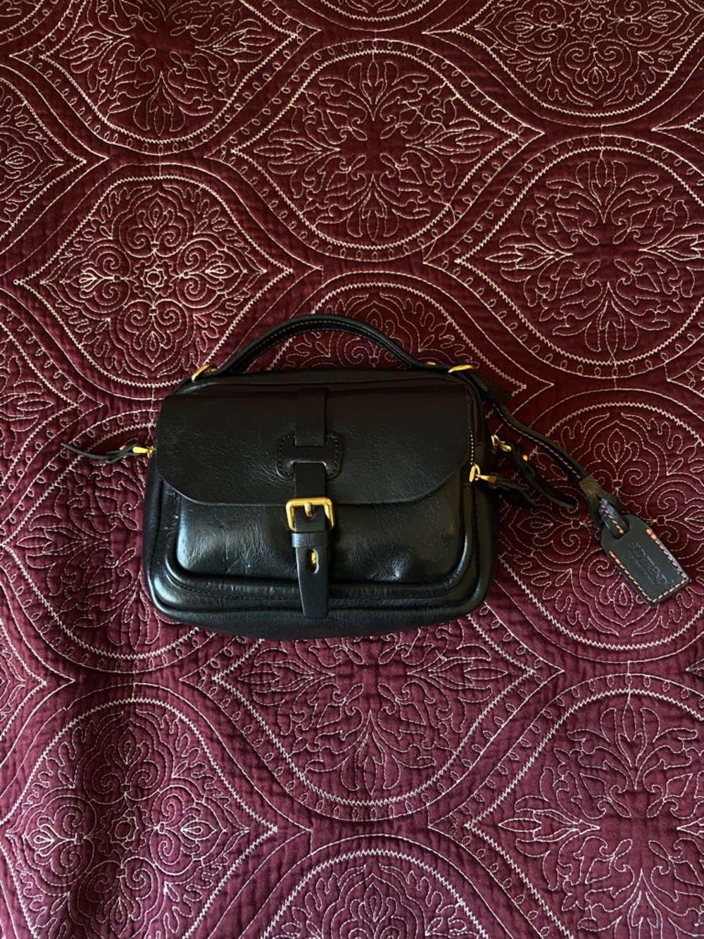 Black Leather Baby Bag with Gold Hardware
